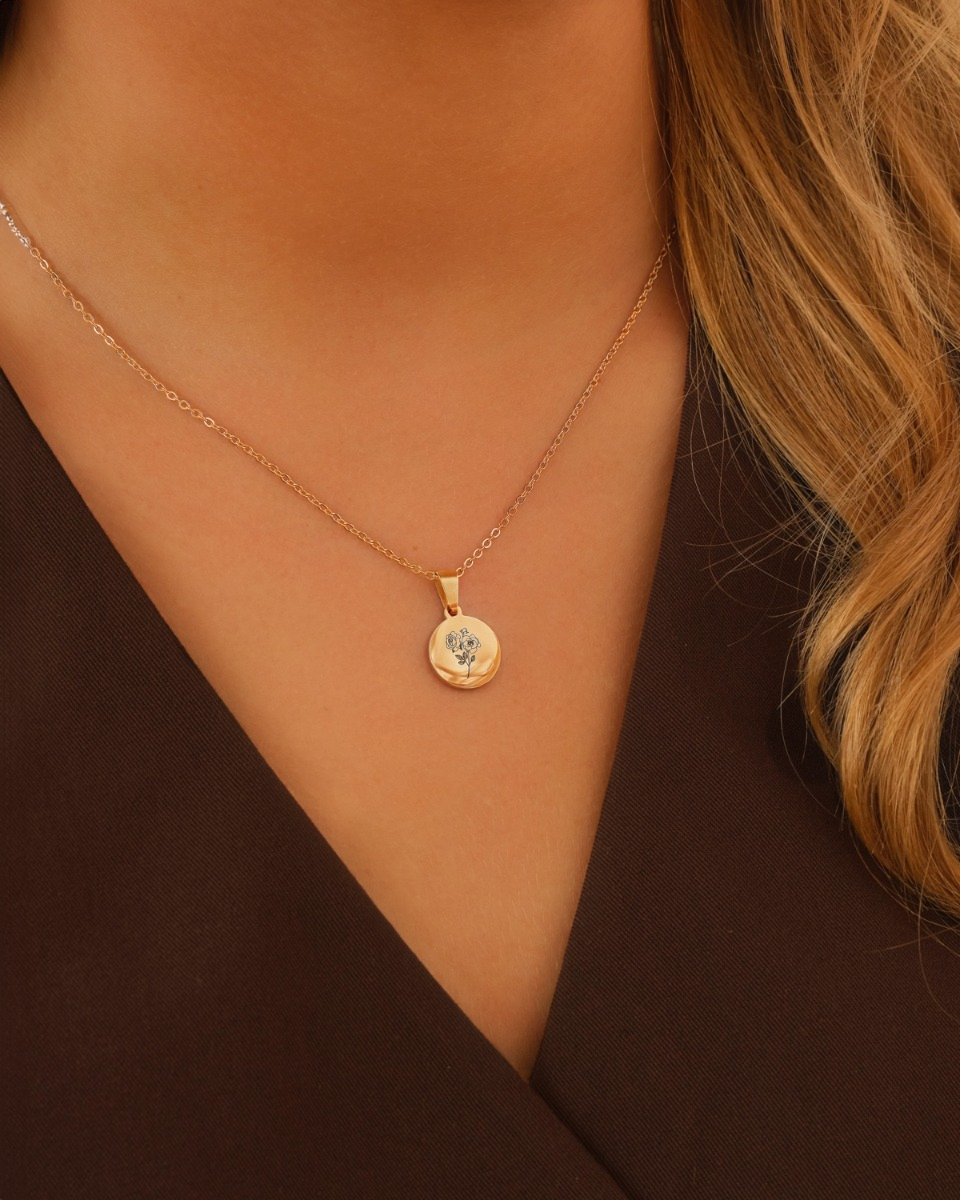 Gouden ketting met geboortebloem