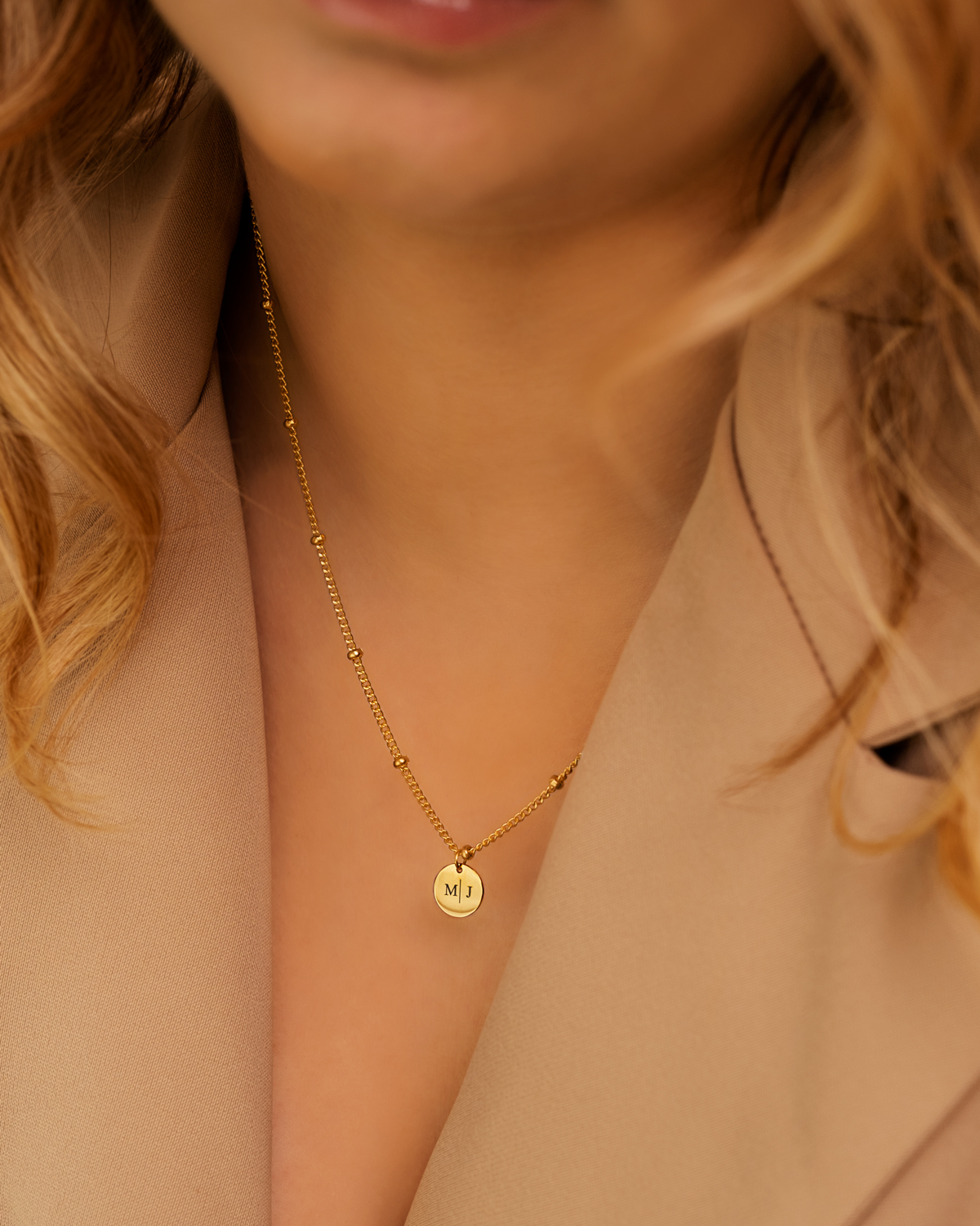 Gouden ketting met graveerbaar muntje