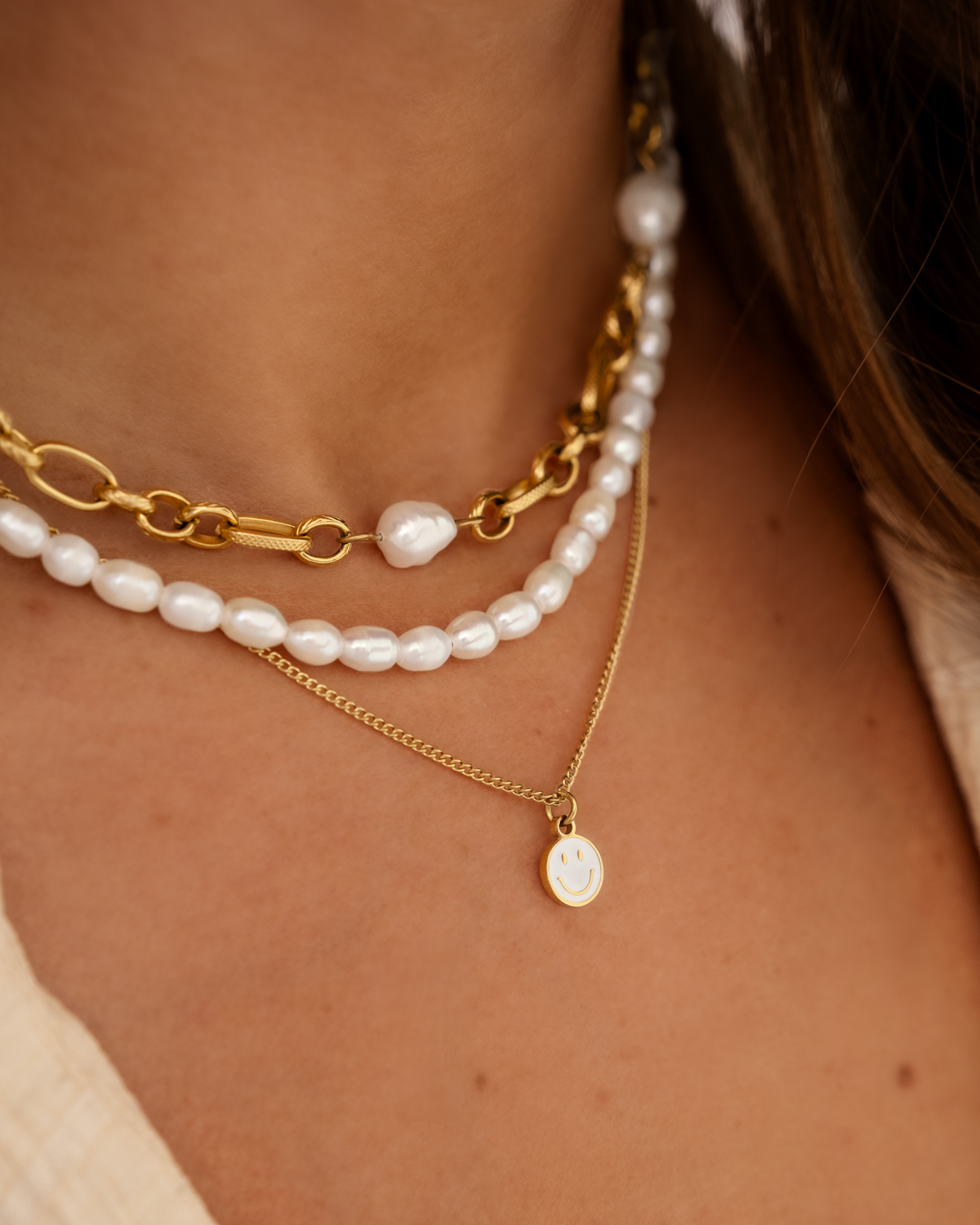 Parel ketting kort kleur goud