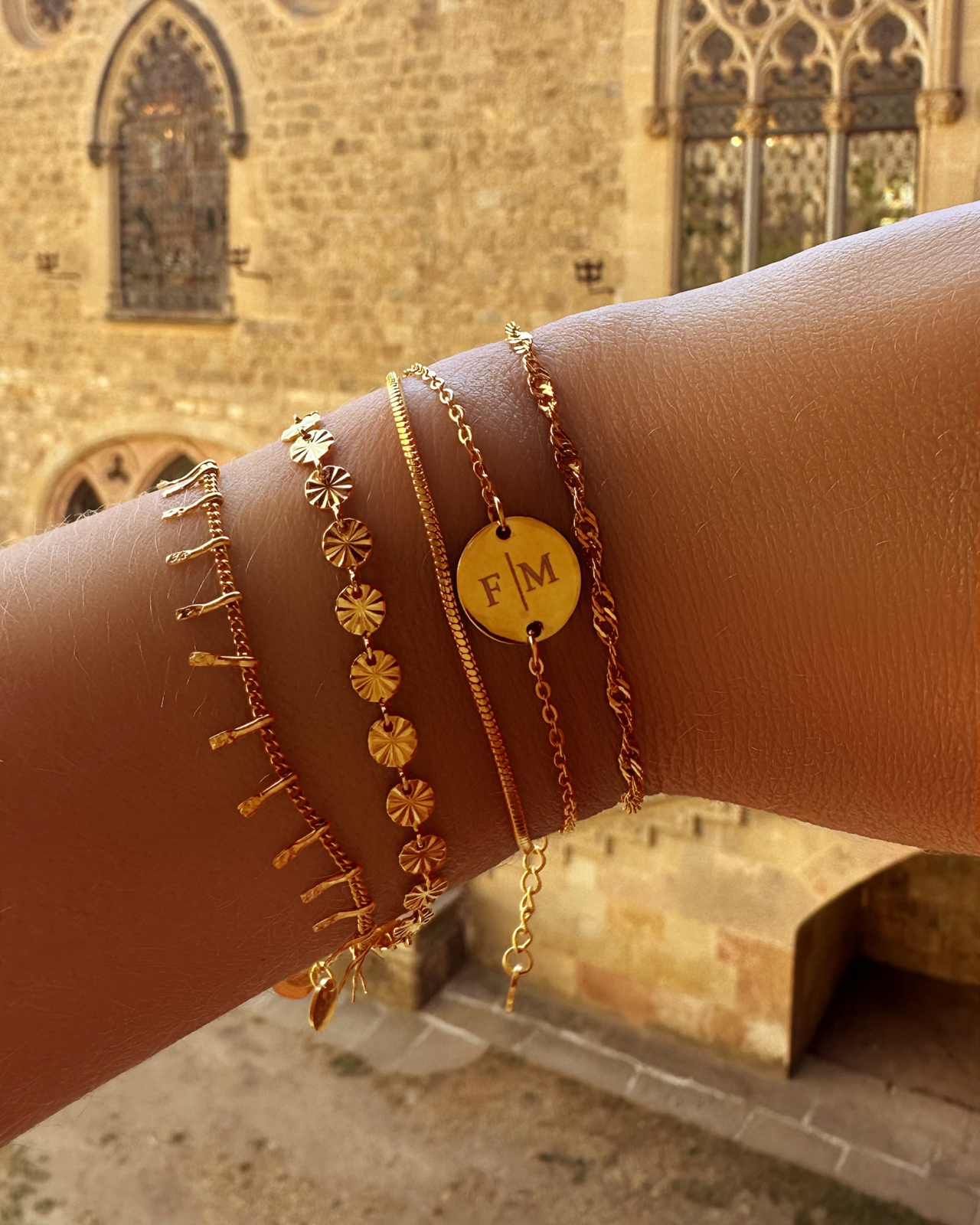 Schakelarmbandje twisted goudkleurig