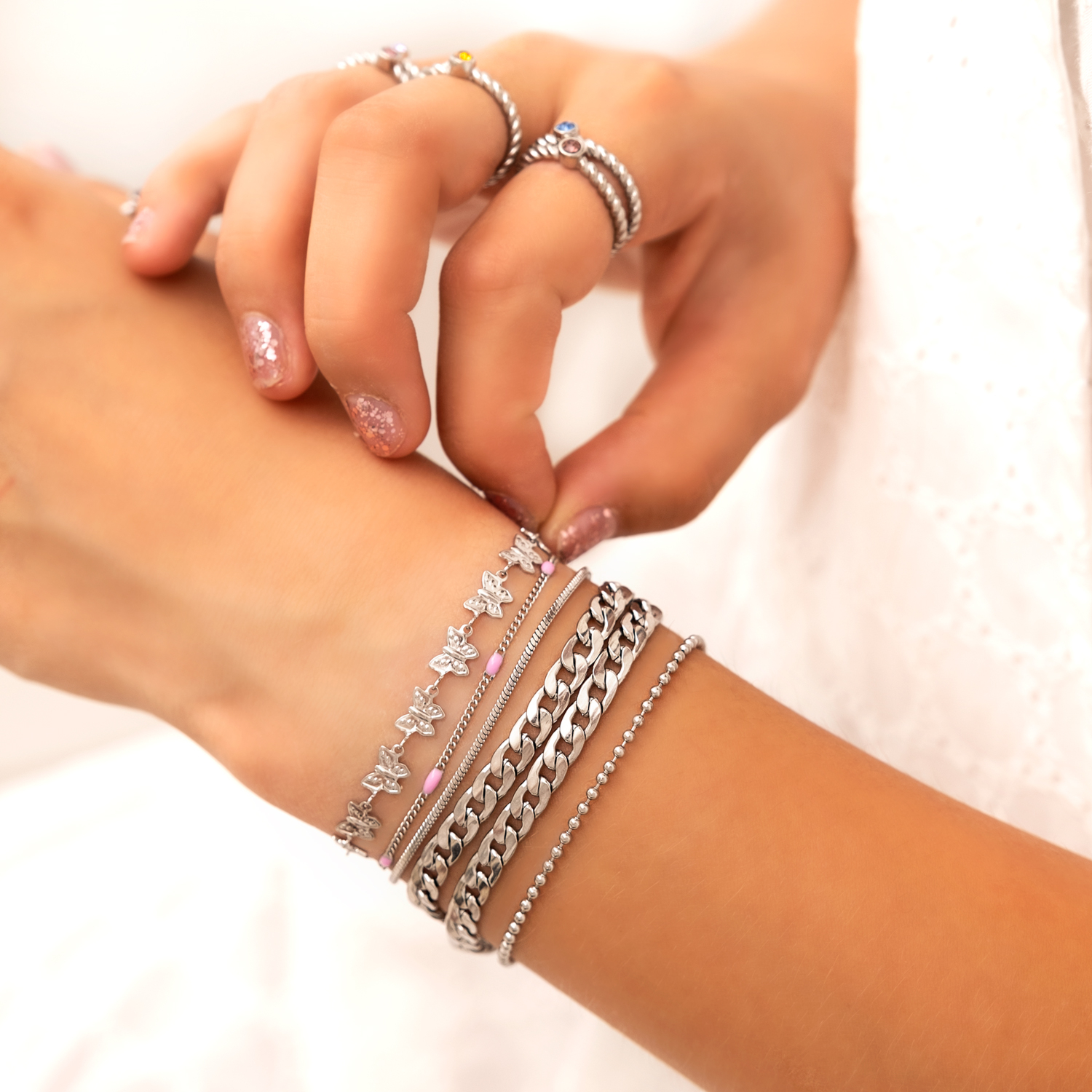 Zilveren armparty met mini snake armband