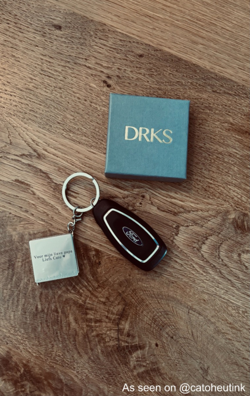 Graveerbare sleutelhanger met rolmaat.