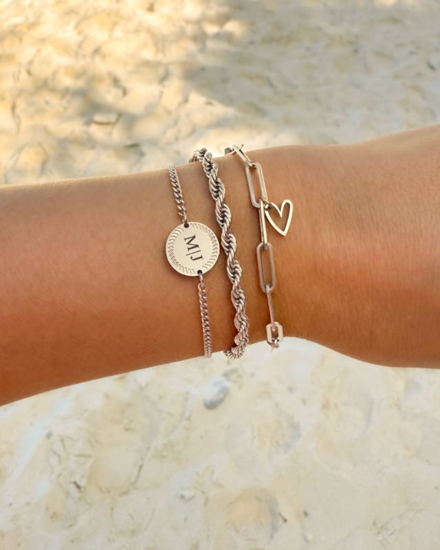 Zilveren armparty met hartjes