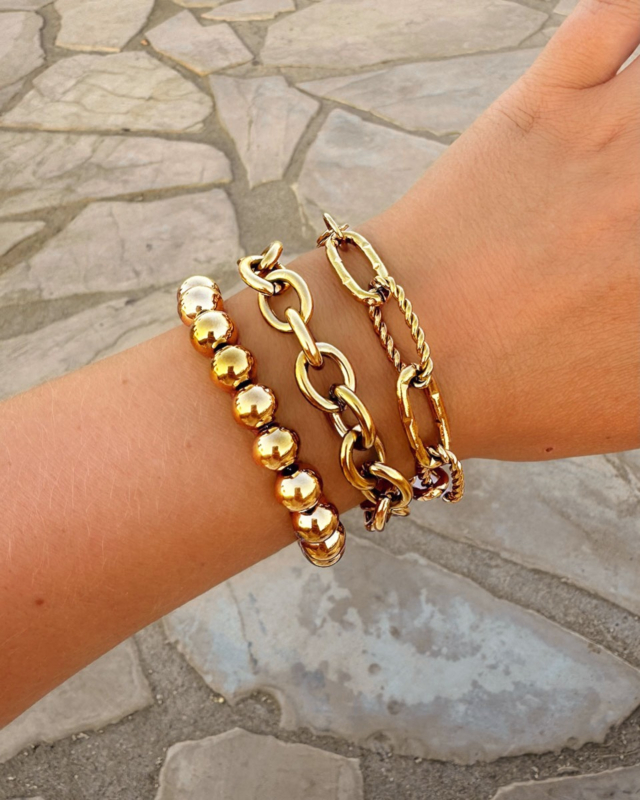 Gouden armparty met chunky chains