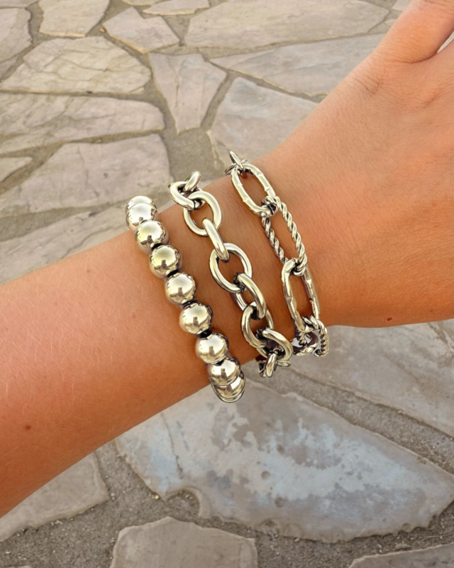 Zilveren schakelarmbanden armparty 