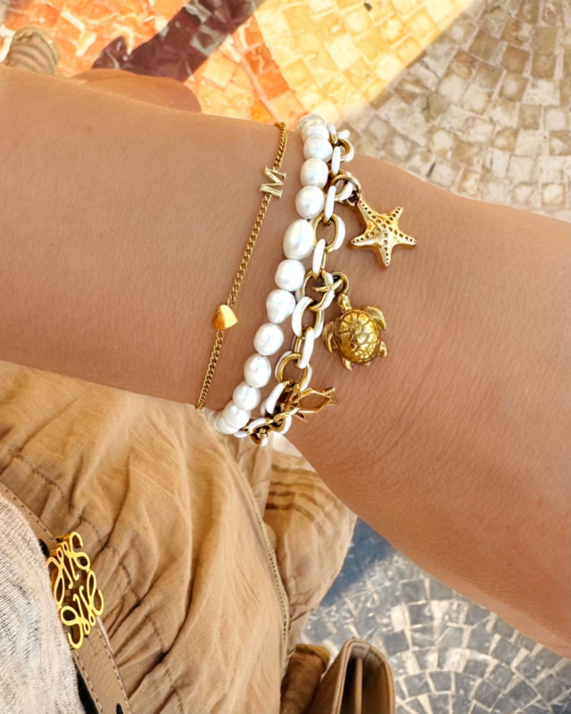 Gouden armparty voor in de zomer
