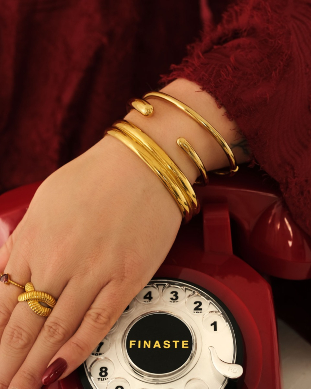 Gouden bangle armparty