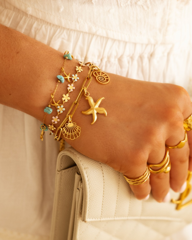 Gouden armparty zeesterren