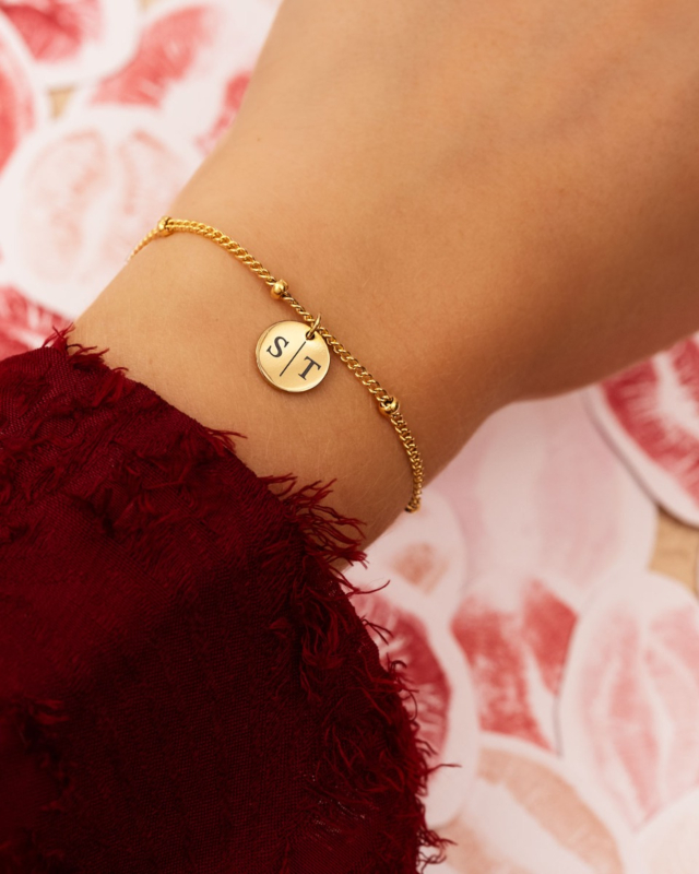 Goud armbandje met muntje