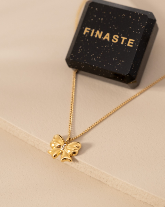 Gouden strik ketting met sieradendoosje