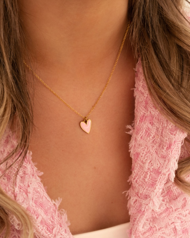 Gouden hartjes ketting met roze hartje