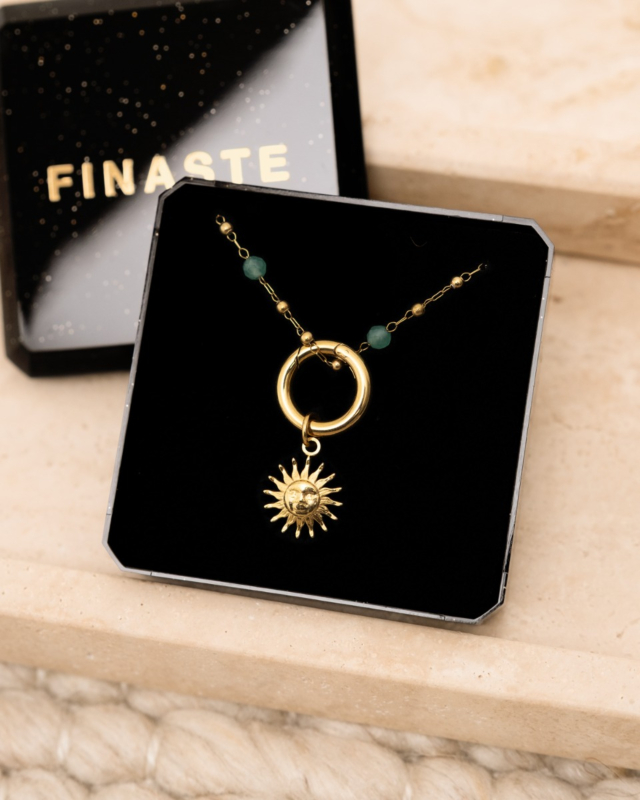 Gouden ketting met zon in sieradendoosje