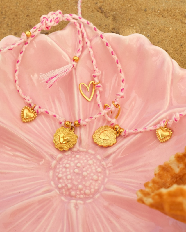 Roze touw ketting en armband met gouden bedels