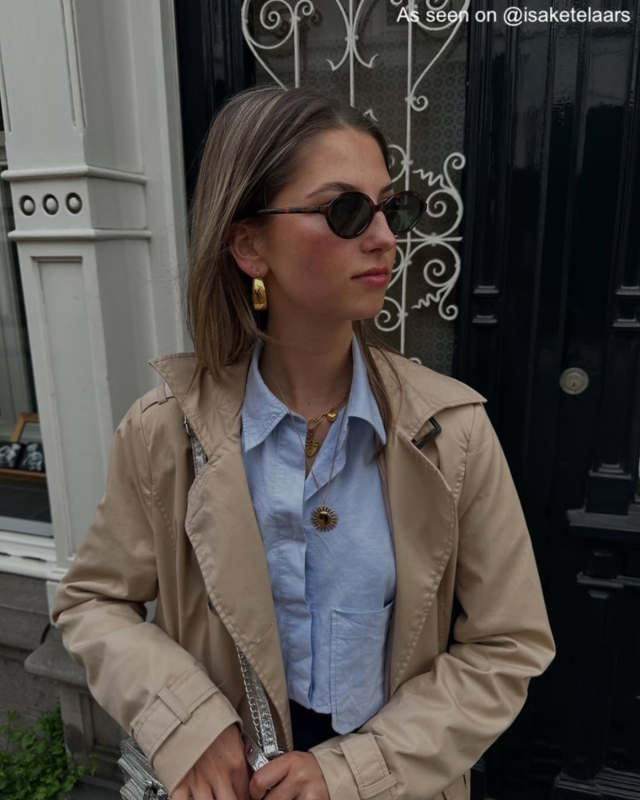 Model met statement zonnetjes ketting 
