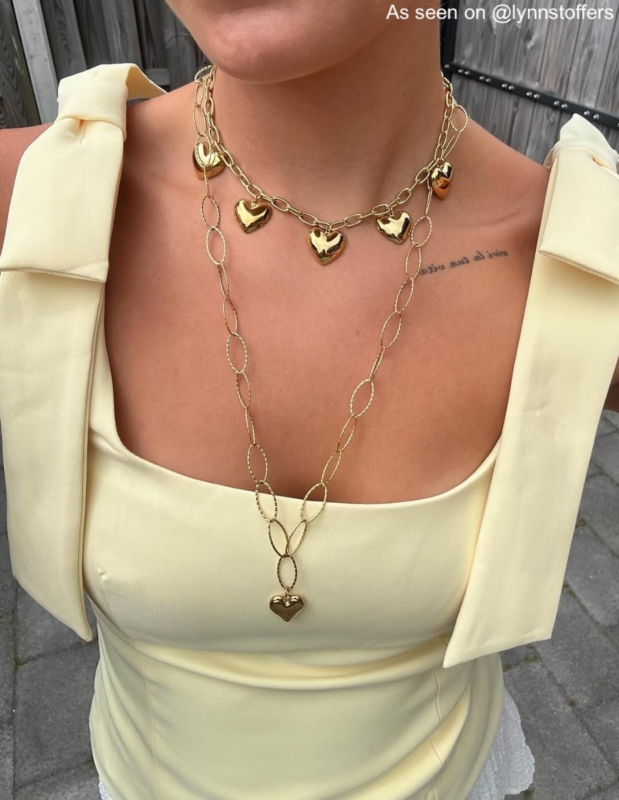 Lange gouden hart ketting.