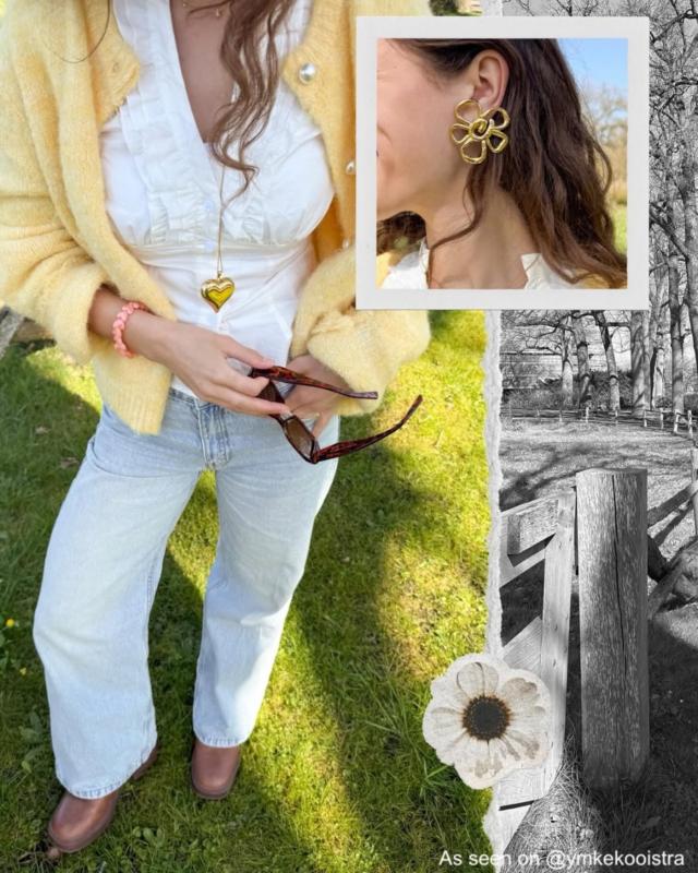 Influencer draagt oranje hartjes kralenarmband