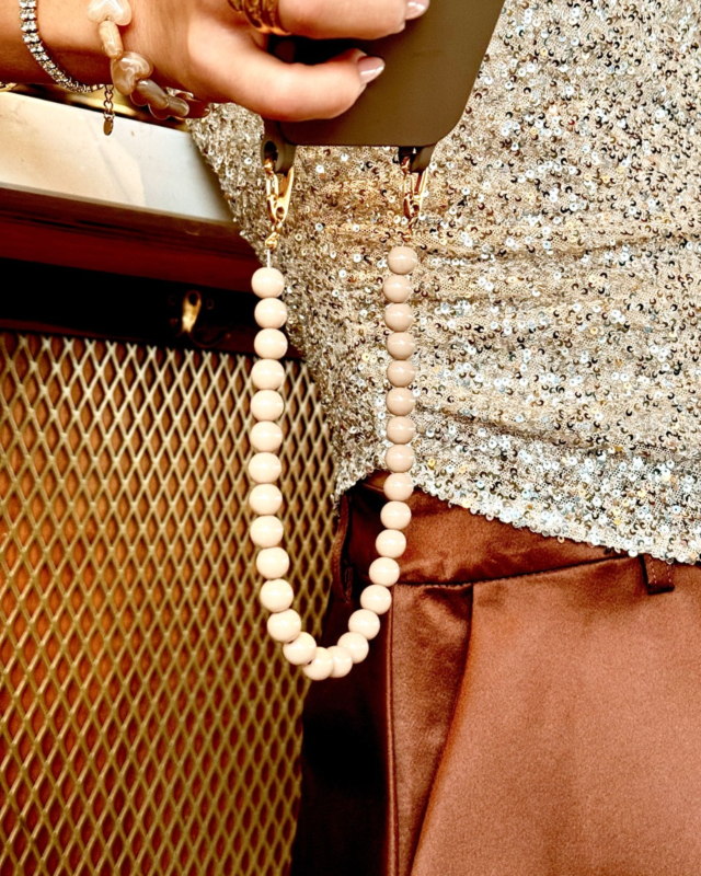 beige telefoonkoord kralen