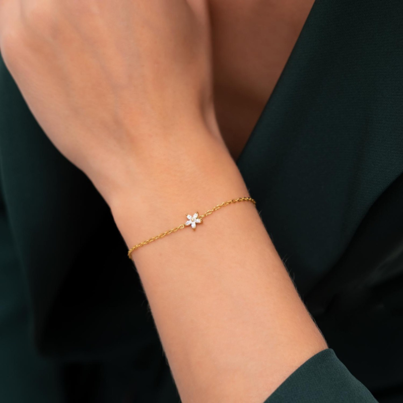 Gouden armband met bloem steentje