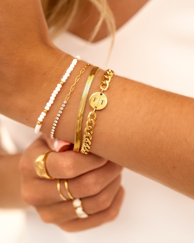 Gouden armparty met wit