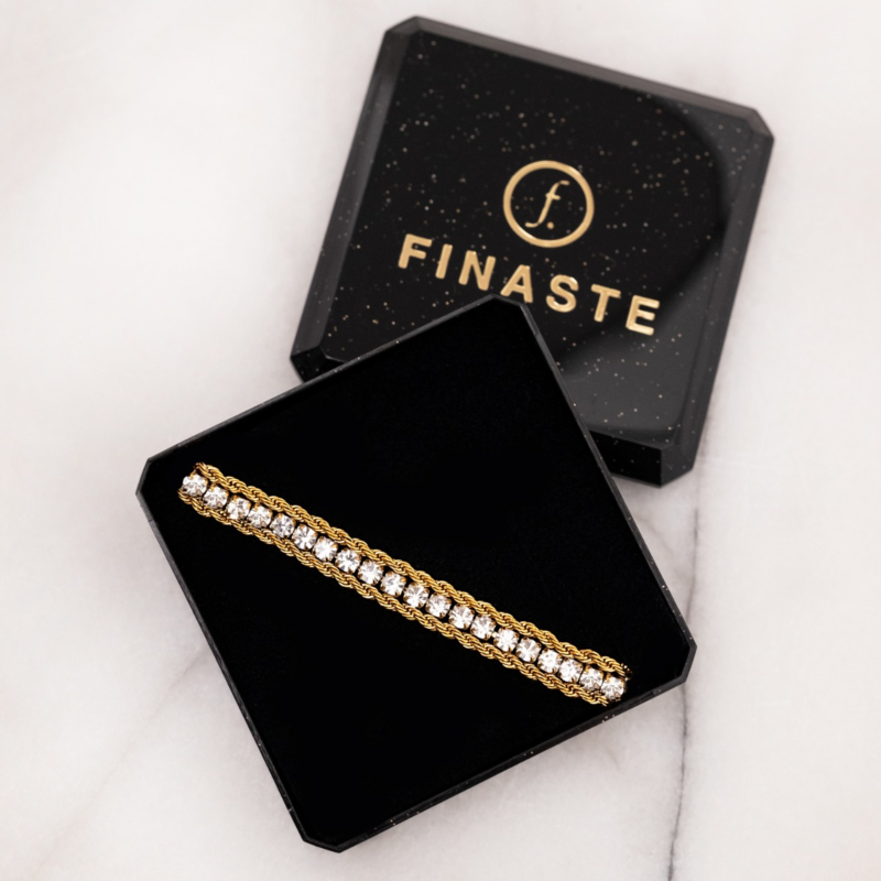 Gouden tennis armband in sieradendoosje