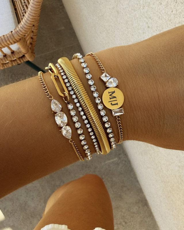 Gouden armparty met steentjes