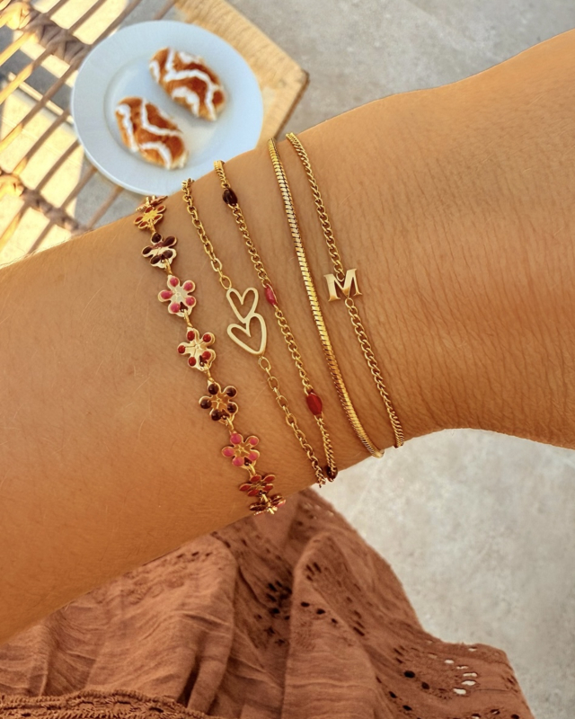 Gouden armparty met kleurtjes