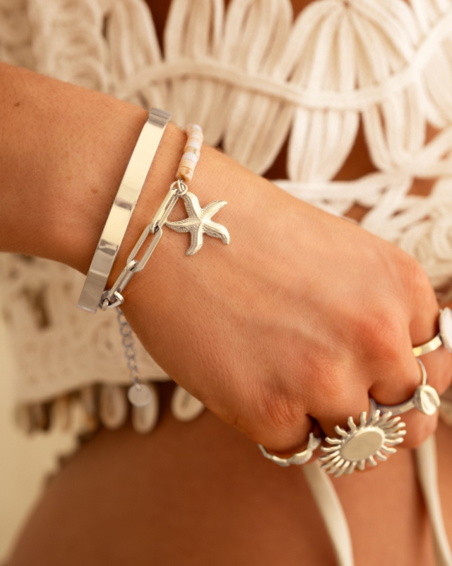 zilveren armbandjes met ringen gecombineerd