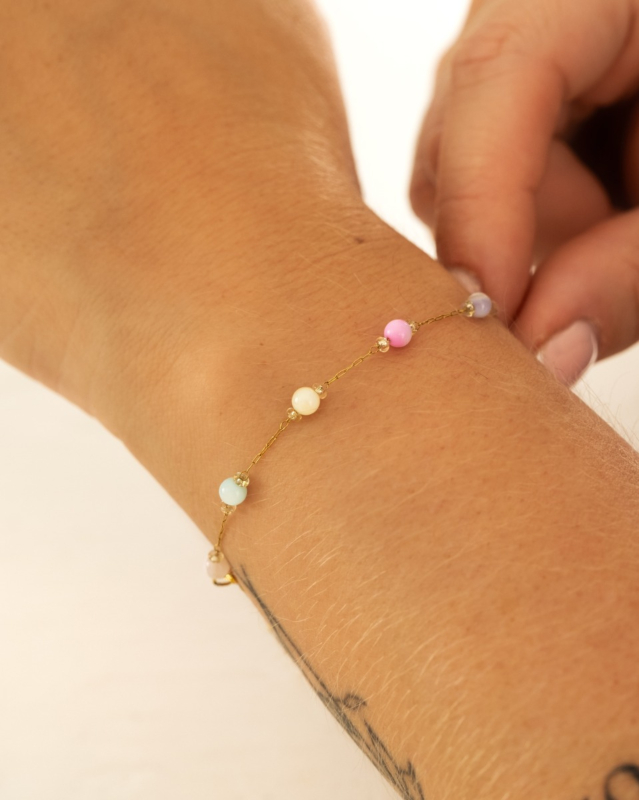 Pastel kraaltjes armband goud