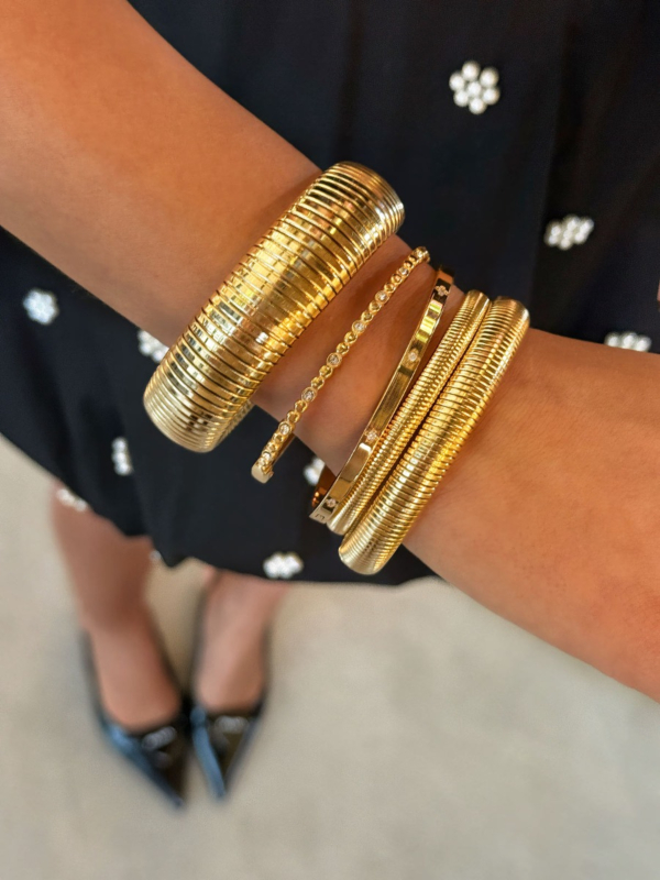 Gouden bangle armparty