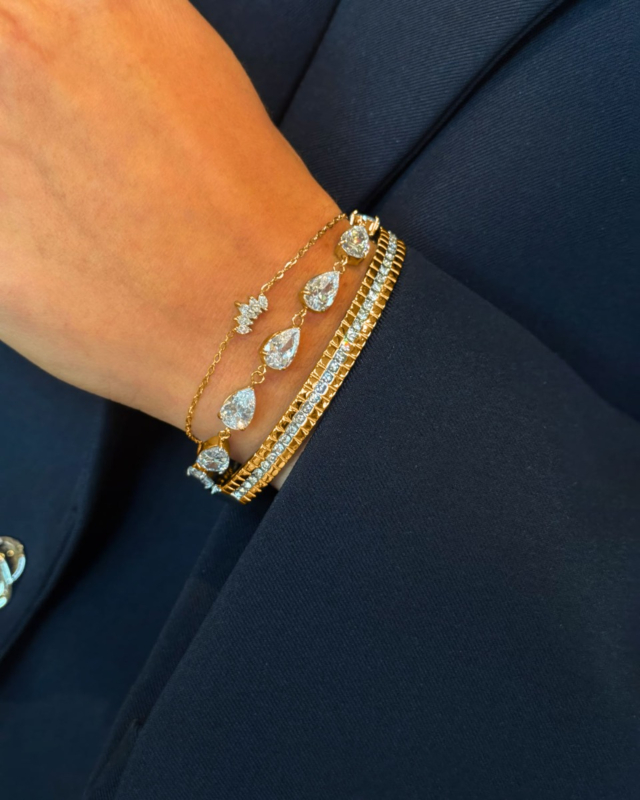 Gouden armparty met steentjes