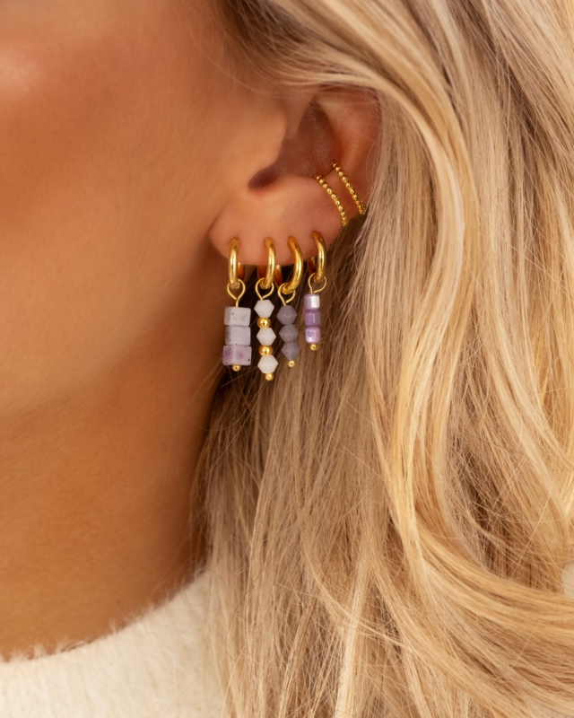 Gouden earparty met lila steentjes