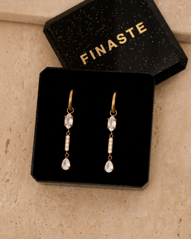 gouden exclusive drop oorbellen in sieradendoosje