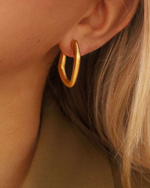 Organic curve oorbellen goudkleurig