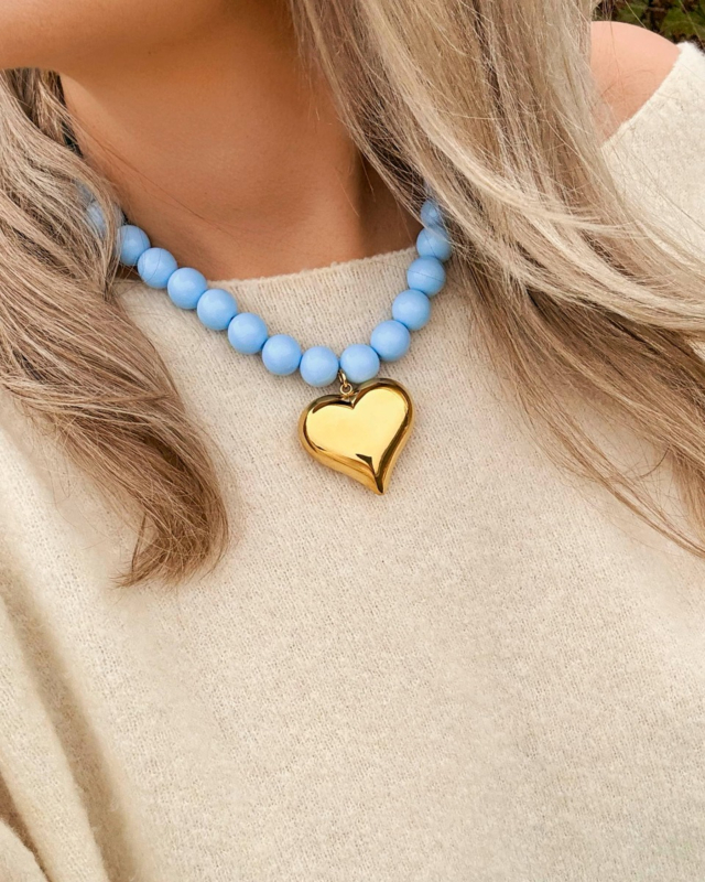 Blauwe kralen ketting met gouden hart