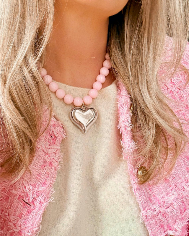 Roze kralen ketting met zilveren hart