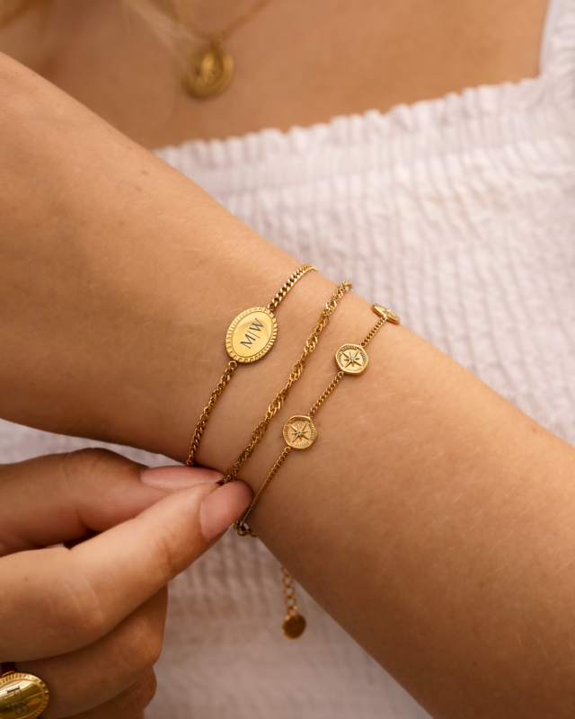 Schakelarmbandje twisted goudkleurig