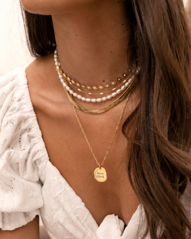 Platte snake ketting goudkleurig