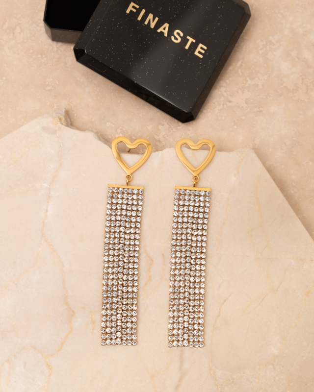 Tennis oorbellen bij sieradendoosje