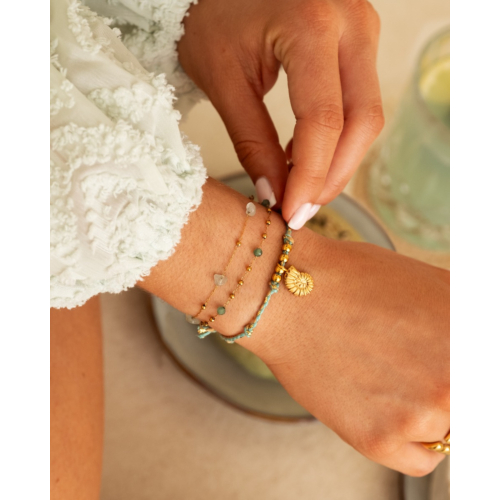 Bolletjes armband groen goudkleurig