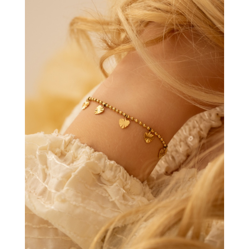 Bolletjes armband met hartjes goudkleurig