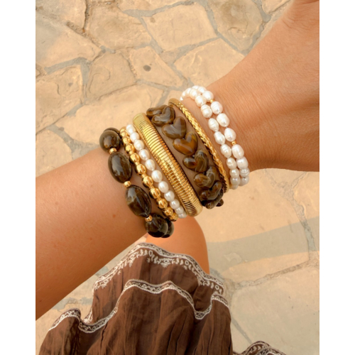 Ovale kralenarmband met bolletjes bruin