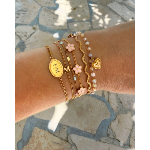 Armband roze bloemetjes goudkleurig