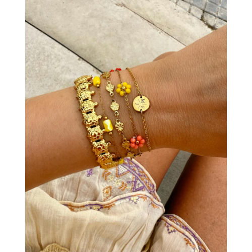 Armband met bloemetjes mix goudkleurig