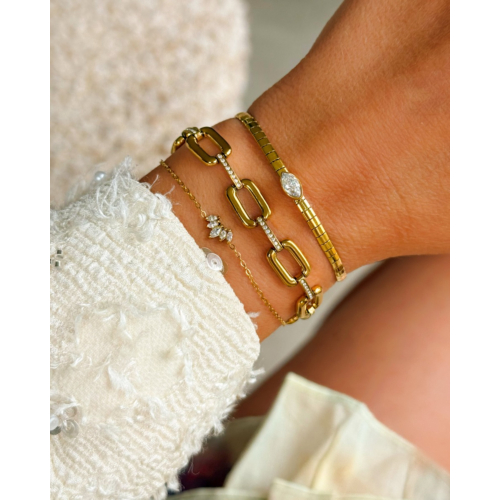 Schakelarmband met steentjes goudkleurig