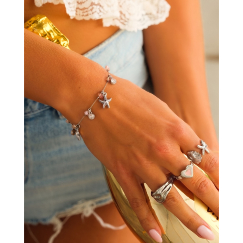Bedelarmband roze steentjes & zee bedels