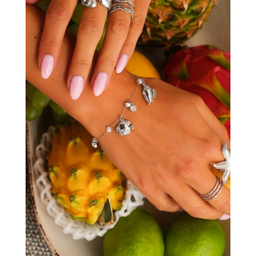 Bedelarmband witte steentjes & zee bedels