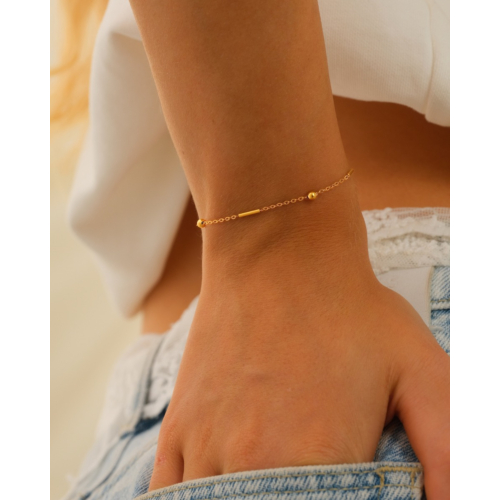 Armband met subtiele bolletjes & tubes goudkleurig
