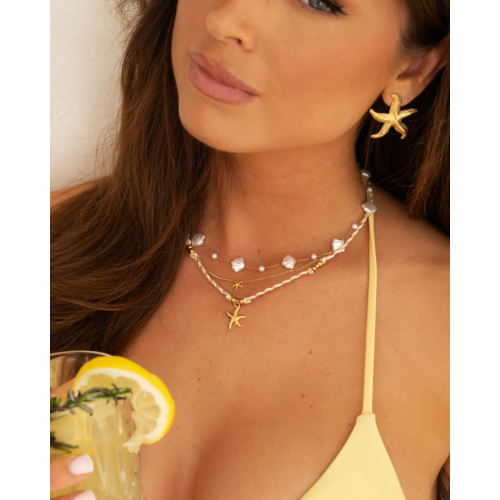 Beige touw ketting zeester goudkleurig