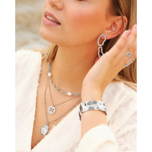 Statement initial ketting