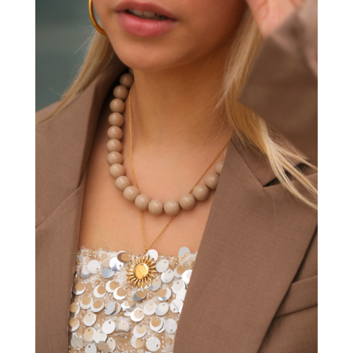 Ketting met zonnetje statement goudkleurig